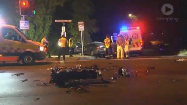 Two motorists were killed after a motorbike sped through a red light in Lane Cove on Saturday morning.  Photo: Ten News Sydney