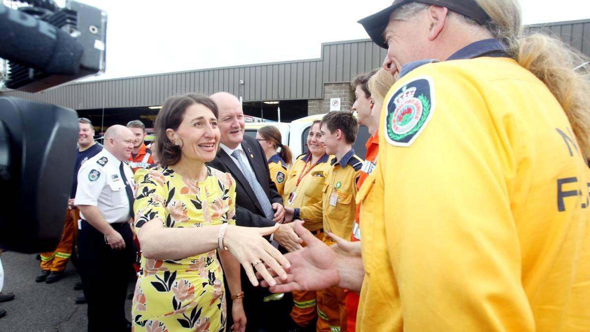 Gratitude: Gladys Berejiklian thanks firefighters at the Sutherland Fire Command Centre. Picture: Chris Lane