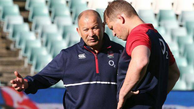 England rugby captain Dylan Hartley, right, with coach Eddie Jones.  Photo: AP