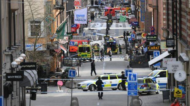 The chaotic scene in central Stockholm after a truck drove through pedestrians and into a department store. Photo: AP