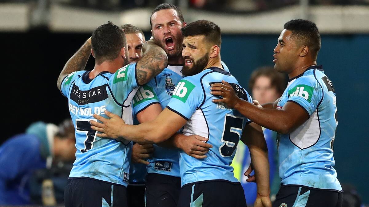 HIGH HOPES: Boyd Cordner and his New South Wales Blues team mates celebrate after he scored a try. Many pundits believe this is New South Wales' year. Picture: Getty Images