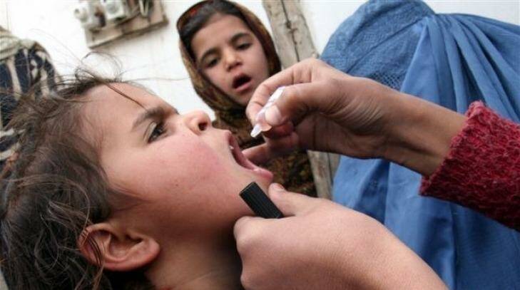 A child is vaccinated against polio in Afghanistan, one of three nations where the disease remains endemic. Photo: Global Polio Eradication Initiative