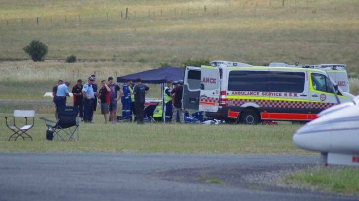 A 14-year-old boy is treated after being injured in a skydiving accident at Goulburn airport. Photo: Darryl Fernance
