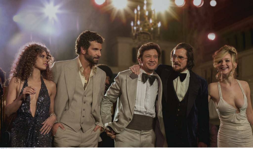 A hustle all right: (From left) Amy Adams, Bradley Cooper, Jeremy Renner, Christian Bale and Jennifer Lawrence.