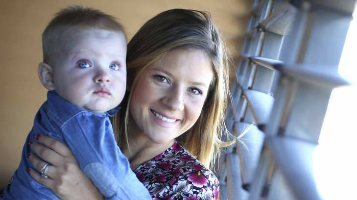 Tegan Couper, pictured with baby Hype, won two court cases against CBA. Photo: James Alcock