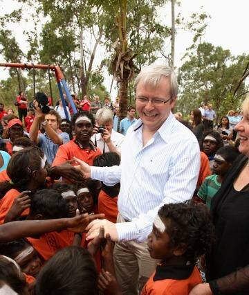 Kevin Rudd, pictured at a school in the East Arnhem Land community of Yirrkala in 2008, has warned of new "stolen generation". Photo: Glenn Campbell GMC