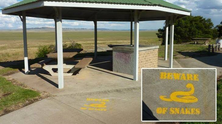 The rest stop at Lake George, just north of Canberra, with a painted snake warning. Photo: Tim the Yowie Man