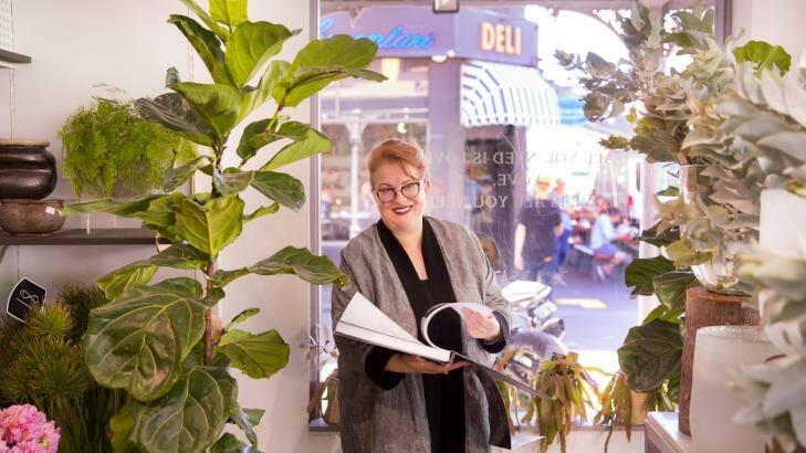 ''It's where my heart is,'' says Flowers Vasette owner Cherrie Miriklis-Pavlou, about Brunswick Street, Fitzroy. Her family has run shops on the street for 80 years. She features in a sumptuous new book about the street. Photo: Simon Schluter