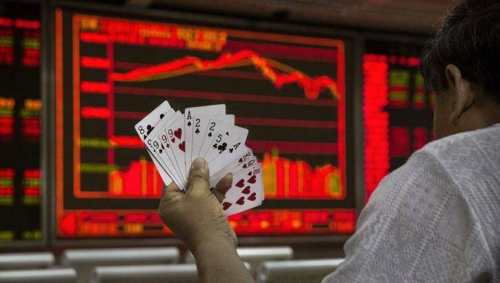 The hand you're dealt: A dramatic sell-off in Chinese stocks caused turmoil around the world. Photo: Kevin Frayer