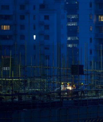 Labourers at a residential construction site in Shanghai this July as fears of a Chinese property bubble grew. 