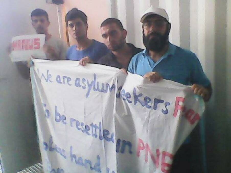 Asylum seekers at Manus Island stage a protest.