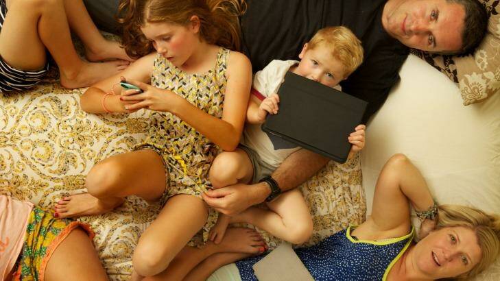 Bedtime rules: Chris and Ainsley Sinnico and their children Olivia, Jamie, and Elliot. Photo: Simon Schluter