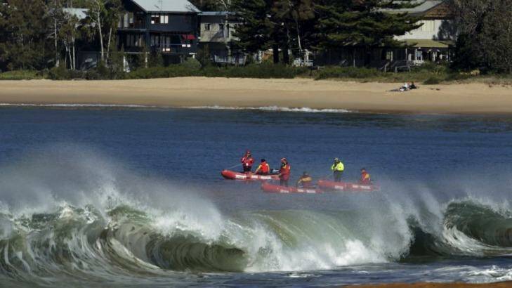Tragedy: Rescue teams search for missing Chayce Kofe off Pearl Beach.  Photo: Dean Sewell