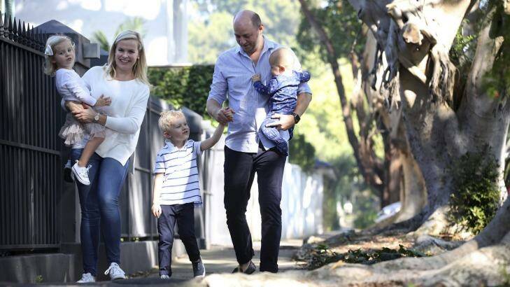 Grace and Alexander Atkinson in Woollahra with their children Jack, 4, Alice, 3, and baby Hugo. Photo: James Alcock