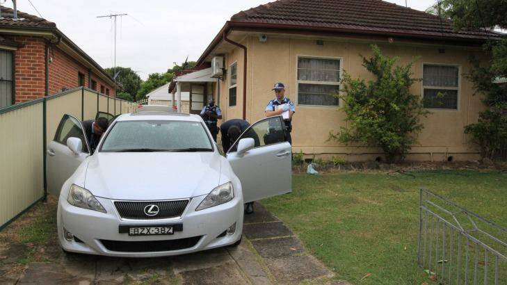 Police search Khanh Thanh Ly's house and two cars in Sydney's inner west. Photo: Peter Rae