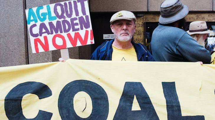 Protesters rally outside AGL Energy's annual meeting in Sydney. Photo: Christopher Pearce