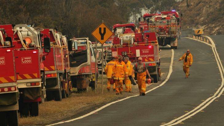Rural Fire Service volunteers fight a blaze near Mount Victoria in October 2013.  Photo: Dean Sewell