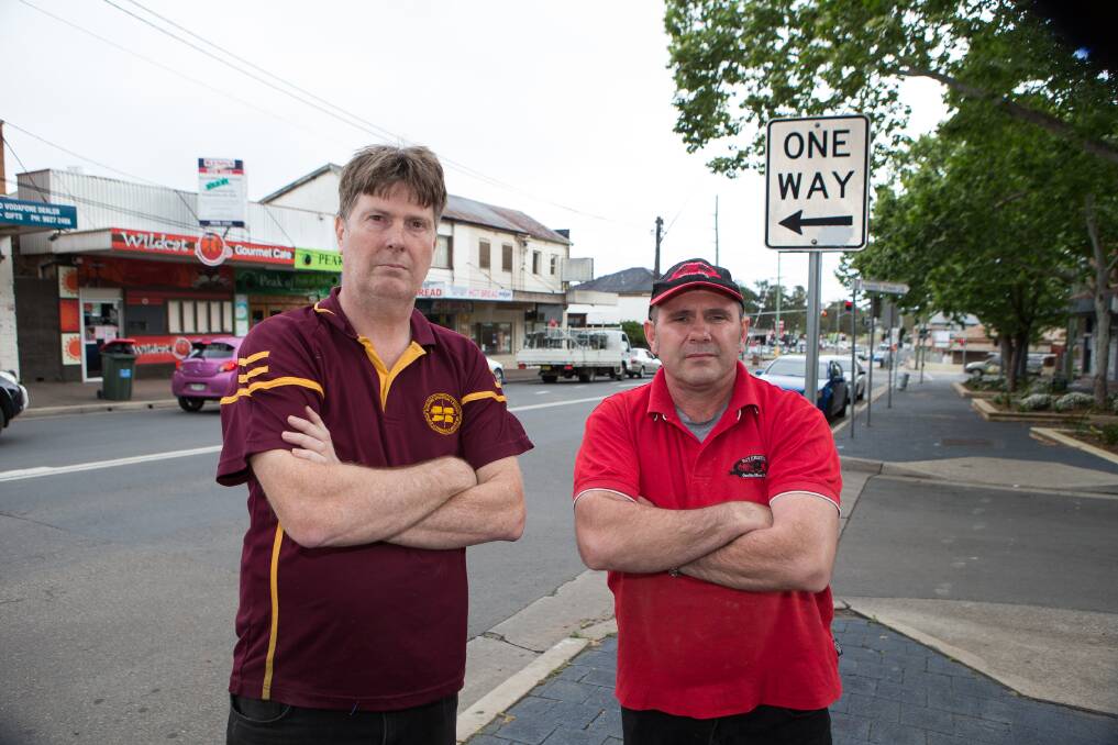 Neglected: Riverstone Chamber of Commerce president Andrew Southwell and Andrew Toirkens from Riverstone Quality Meat Market fear Garfield Road East will become a ghost town unless they get more help from Blacktown Council. "We want to work with the council for the betterment of Riverstone," Mr Southwell said. Picture: Geoff Jones