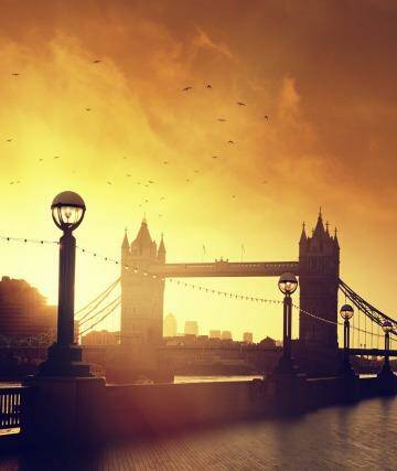 Tower Bridge in London at dawn.