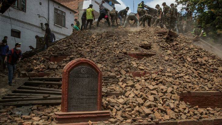 Volunteers and emergency workers search for bodies buried under the debris of one of the temples at Basantapur Durbar Square in Kathmandu, Nepal. Photo: Omar Havana