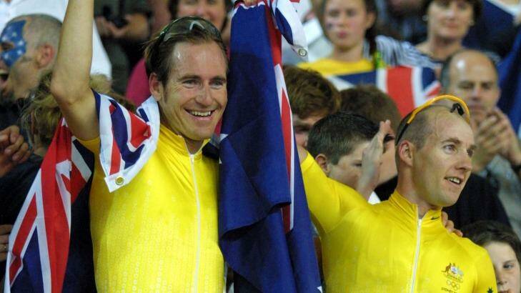 Scott McGrory and Brett Aitken win the men's madison at the Sydney Olympics. Photo: Mike Powell
