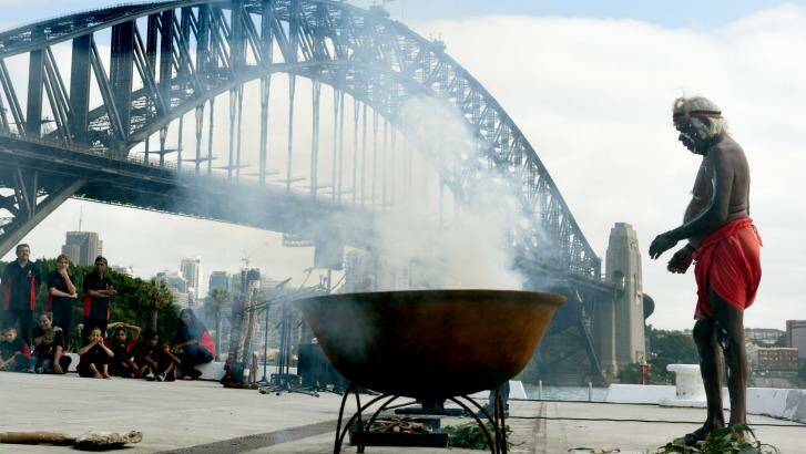 Uncle Max Eulo conducts a smoking ceremony during the official announcement of the Australia Day 2016 program. Photo: Steven Siewert