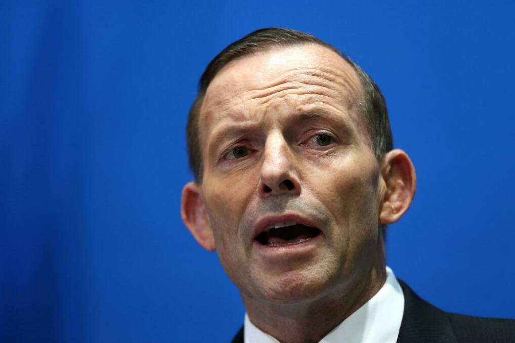 Prime Minister Tony Abbott says tax arrangements between the states can change without small states being worse off. Photo: Alex Ellinghausen