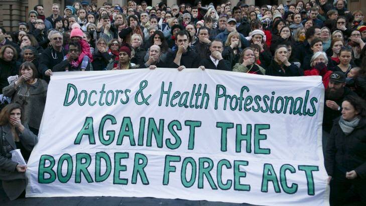 Doctors and Health Professionals protesting new laws that threaten them with jail if they reveal conditions in detention centres. Photo: Fiona Morris