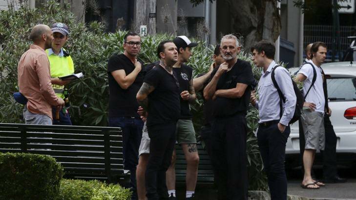 Ben Milgate looks on with his staff outside his restaurant Porteno in Surry Hills.

 Photo: Wolter Peeters