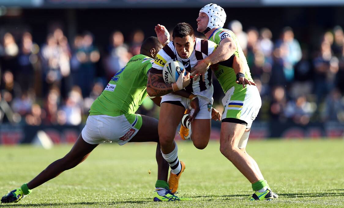 SYDNEY, AUSTRALIA - JULY 26:  Dean Whare of the Panthers is tackled by Jarrod Croker and Edrick Lee of the Raiders during the round 20 NRL match between the Penrith Panthers and the Canberra Raiders at Pepper Stadium on July 26, 2015 in Sydney, Australia.  (Photo by Renee McKay/Getty Images)