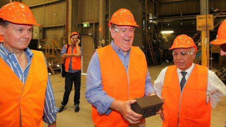 Brickworks managing director Lindsay Partridge, left, with the then opposition leader Barry O'Farrell, at Austral Brickworks on March 12, 2011. Photo: Anthony Johnson