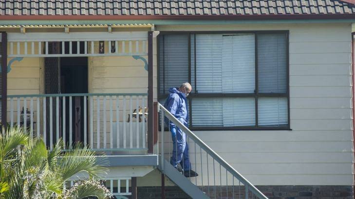 Forensic officers search the Bundeena home where Ms Kontozis died.  Photo: Nic Walker