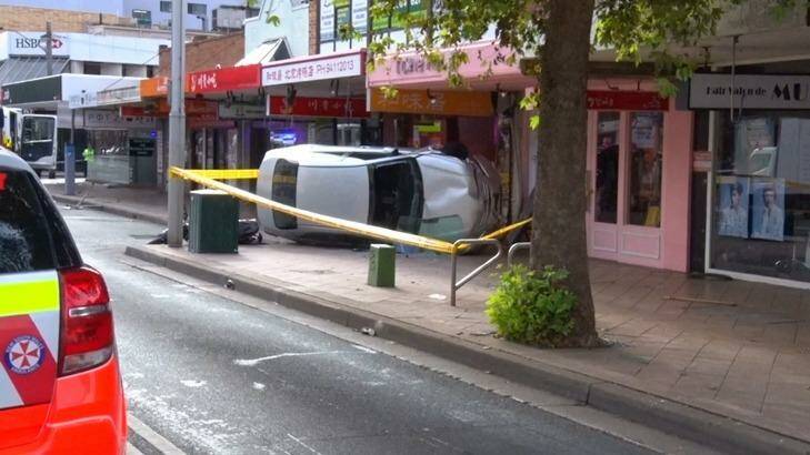 A woman has been critically injured after a car mounted the footpath and struck her in Chatswood.  Photo: TNV