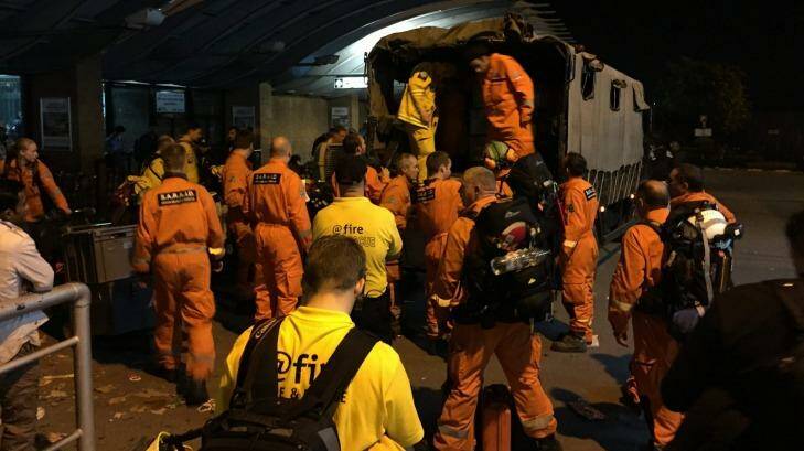 British search and rescue workers load a truck in  with specilaist equipment at Tribhuvan International Airport, Kathmandu. Photo: Matt Wade