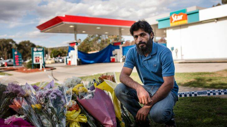 Victims Zeeshan Akbar's friend, housemate and colleague Adnan Amjid, at the scene of the fatal stabbing at the Queanbeyan Caltex service station.

Adnan Amjid was starting his midnight shift at caltex petrol station on Friday night, and was the first to arrive at the scene to find Zeeshan Akbar dead.

Photo: Jamila Toderas Photo: Jamila Toderas