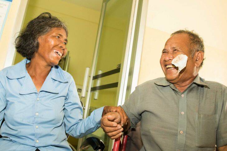 Ngin Chan holds the hand of his wife Phork and rejoices as he is able to see his love again for the first time in three years.
The Fred Hollows Foundation for Lindsay Murdoch??????s story from Cambodia.Photos: Mary Tran / The Fred Hollows Foundation
