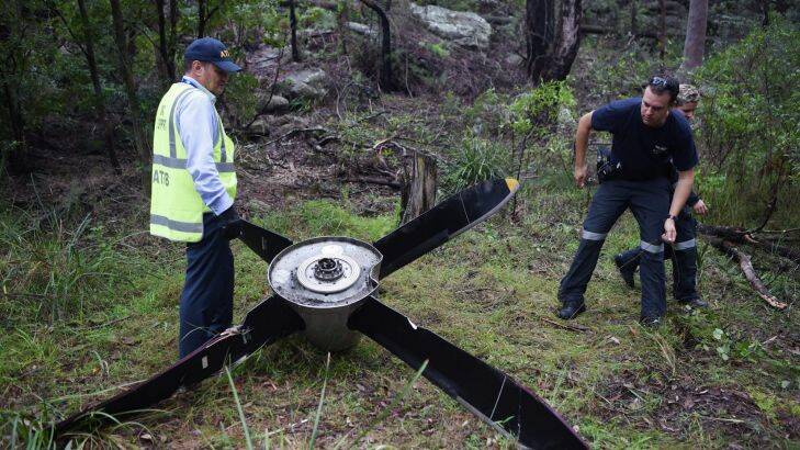 ATSB and POLAIR look at a propeller that fell off an aircraft on approach to Sydney Airport. Found near River Rd in Revesby. Pic Nick Moir 22 march 2017 Photo: Nick Moir
