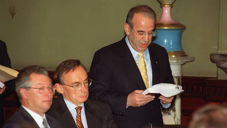 Ready to serve: Eddie Obeid is sworn in to the NSW cabinet in 1999 as Premier Bob Carr (centre) and Treasurer Michael Egan look on. Photo: Fairfaxsyndication.com