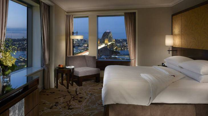 $1550 a night: Bedroom of the executive grand harbour view suite at the Shangri-La hotel in Sydney. Photo: Supplied