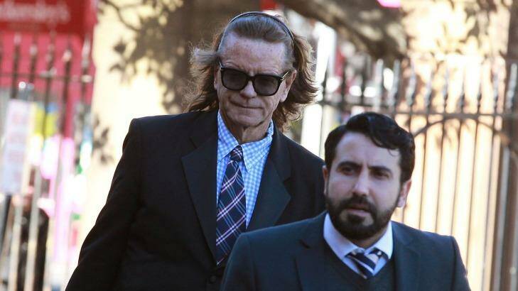 Charles Waterstreet (left) arrives at the murder trial of Roger Rogerson and Glen McNamara in July. Photo: Ben Rushton
