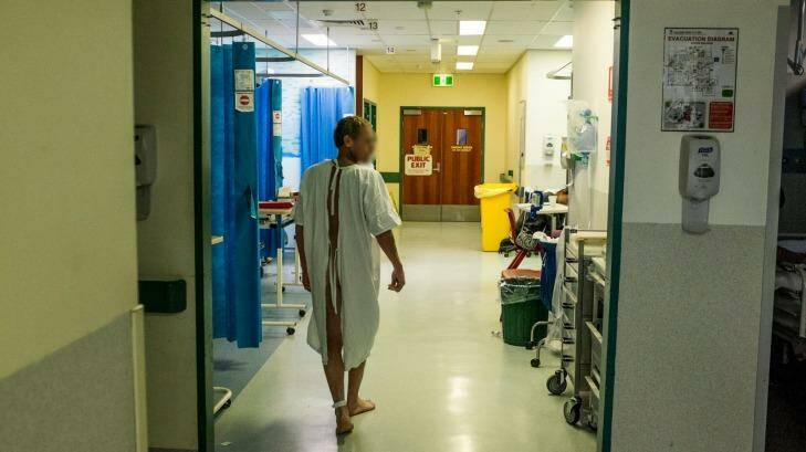 An intoxicated male walks the around the  emergency department at Calvary Hospital.
 Photo: Jay Cronan