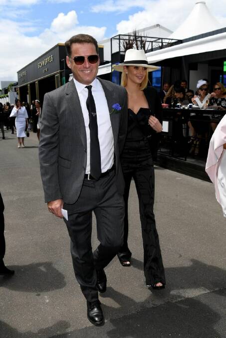 Karl Stefanovic and Jasmine Yarbrough in the Birdcage on Victoria Derby day at Flemington Racecourse in Melbourne, Saturday, November 4, 2017. (AAP Image/Joe Castro) 