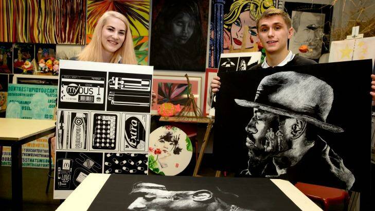 Dulwich High School students Lucy Howroyd and Thomas Carman with their art.   Photo: Edwina Pickles