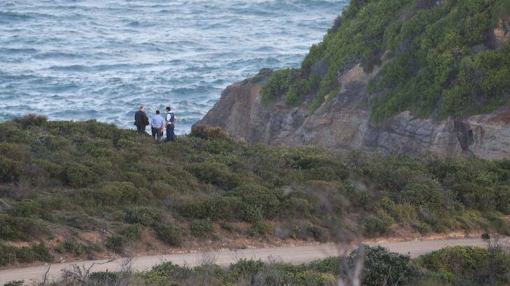 NSW Police and Detectives at the scene of a suspected murder at Snapper Rocks in Lake Munmorah National Park.  Photo: Marina Nei