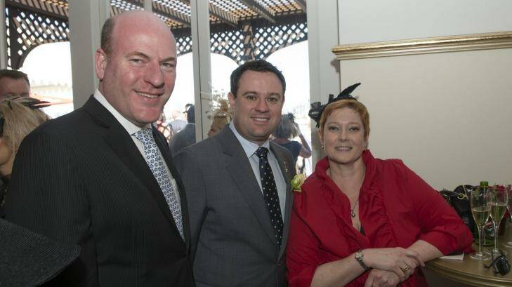 Trent Zimmerman, NSW MP Stuart Ayres and Liberal senator Marise Payne at the Emirates marquee on Melbourne Cup Day in 2013. Photo: Jesse Marlow