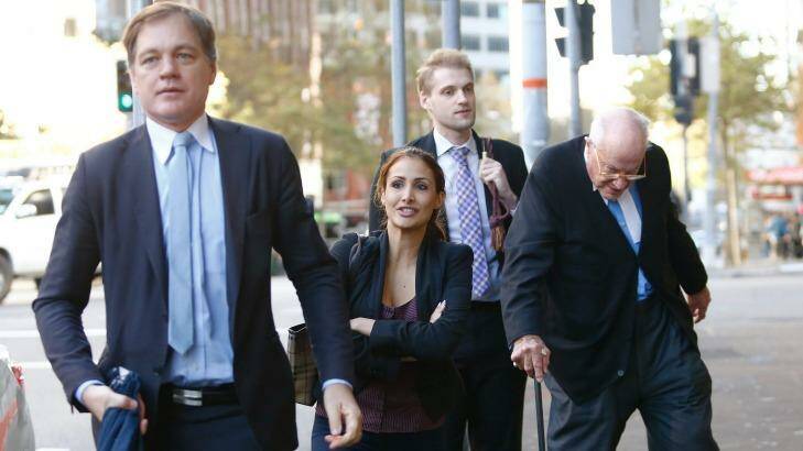 Rachelle Louise arrives at court on Wednesday with her legal team. Photo: Daniel Munoz