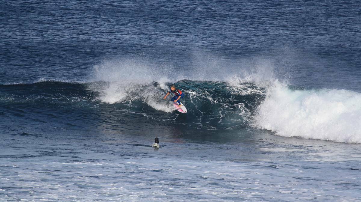 Round two of the women's heats saw Coco Ho, Dimity Stoyle, Sally Fitzgibbons, Paige Hareb and Johanne Defay advance to the third round while across the channel some of the men were scoring barrels at The Box. Photo by Sandy Powell. 