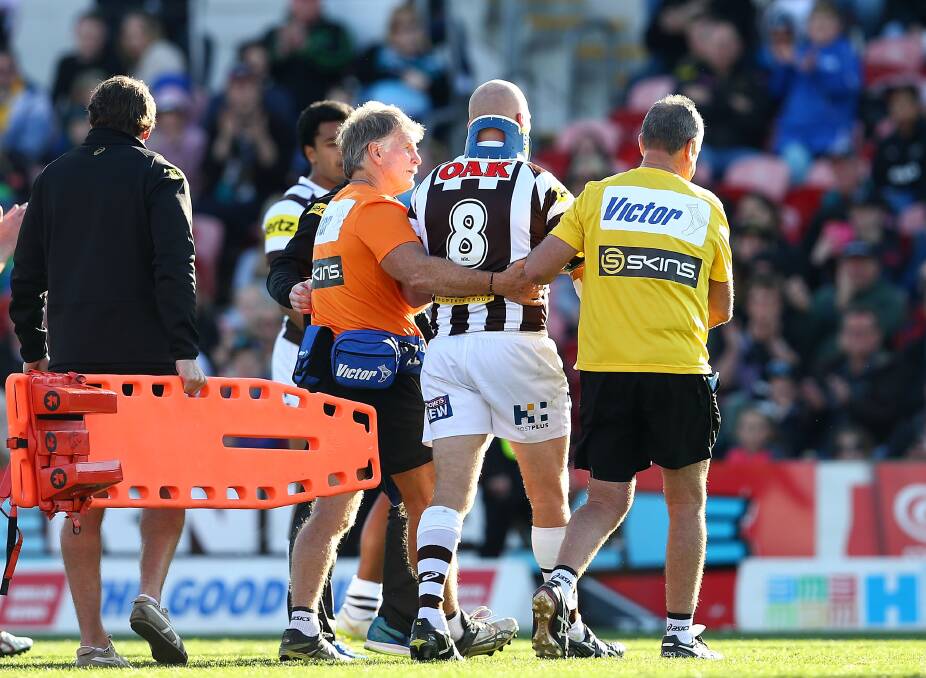 Injury concerns: Nigel Plum leaves the field with a neck brace during the round 20 NRL match between the Penrith Panthers and the Canberra Raiders at Pepper Stadium. Picture: Renee McKay/Getty Images. 