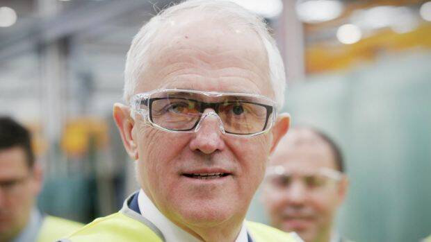 Prime Minister Malcolm Turnbull faced a barrage of questions about the NBN on a visit to the CSR Viridian glass facility in Canberra on Monday Photo: Andrew Meares
