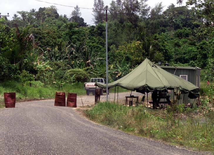 Manus Island: Transfield Services have confirmed they will continue the use of local security staff to guard the detention centre despite the implications of the staff in last week's riots. Photo: Angela Wylie